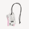 Men’s charm/keychain train ticket in white/black/pink