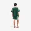 Men’s extreme tie dye relaxed fit shorts in green/white