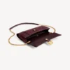 Women’s hourglass pochette with chain in dark burgundy