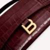 Women’s hourglass pochette with chain in dark burgundy