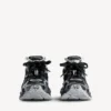 Women’s runner sneaker in black/silver