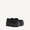 Women’s strike platform derby in black