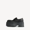 Women’s strike platform derby in black