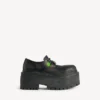 Women’s strike platform derby with charms in black/multicolor